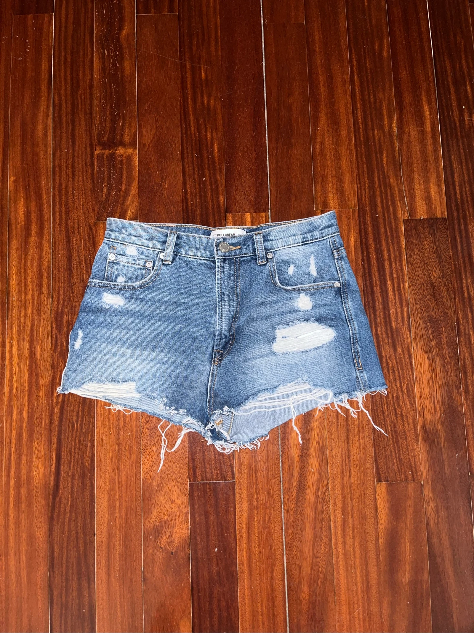 pantalón corto azul